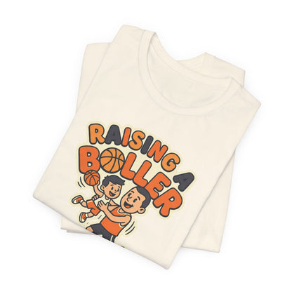 Raising a Baller Basketball T-Shirt | Parent Pride Tee | Perfect Gift for Hoops Families