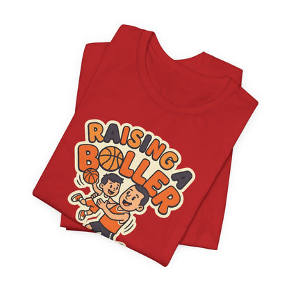 Raising a Baller Basketball T-Shirt | Parent Pride Tee | Perfect Gift for Hoops Families