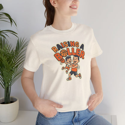 Raising a Baller Basketball T-Shirt | Parent Pride Tee | Perfect Gift for Hoops Families