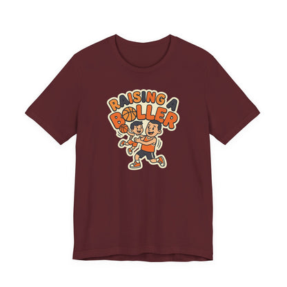 Raising a Baller Basketball T-Shirt | Parent Pride Tee | Perfect Gift for Hoops Families